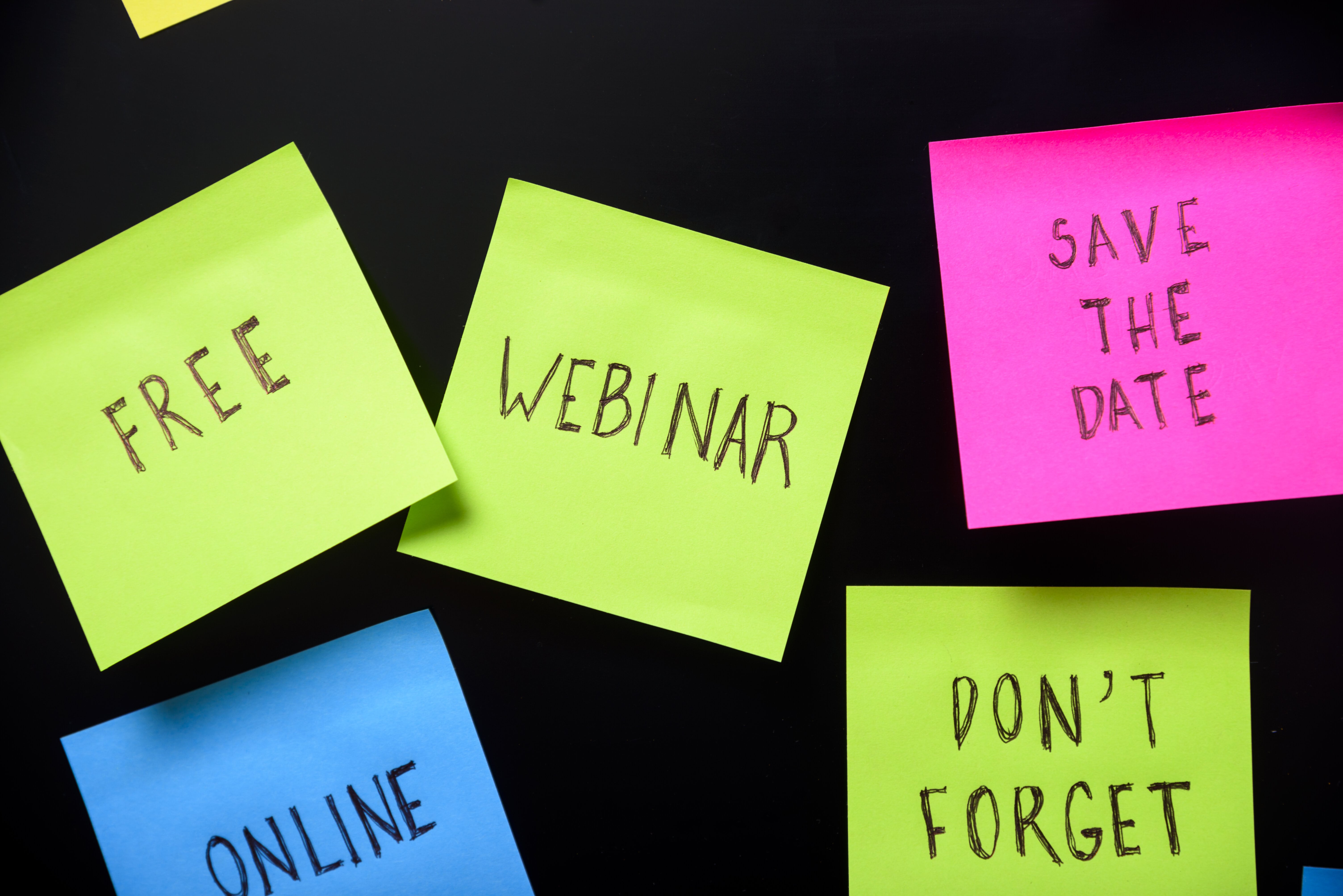Sticky notes saying Free Webinar, Save the Date, Don't Forget