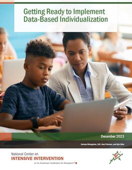 Cover of readiness brief saying Getting Ready to Implement Data-Based Individualization and showing a teacher and student working together on a computer